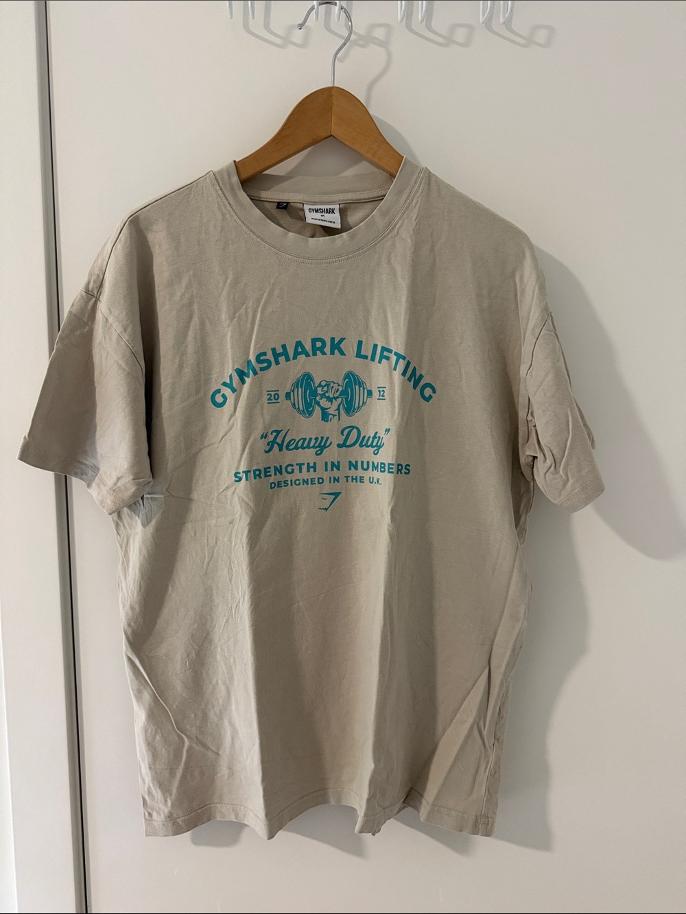 Gymshark Light Beige Tee with Teal Script